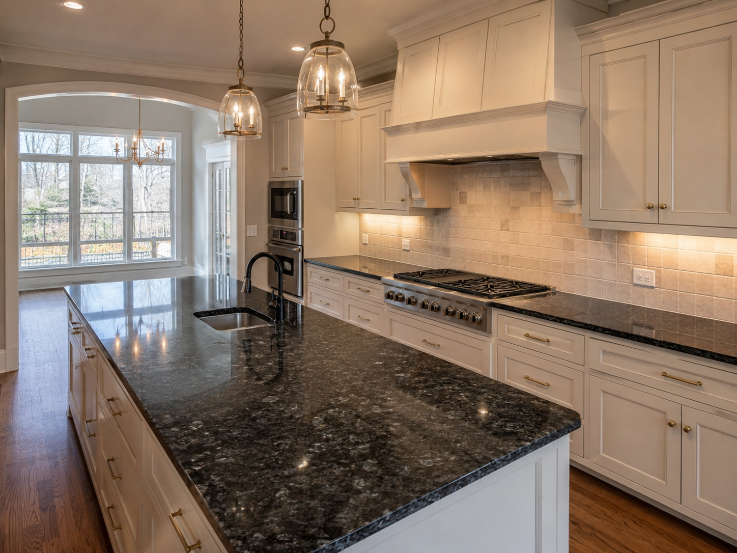 Speckled granite countertop in a bright white kitchen